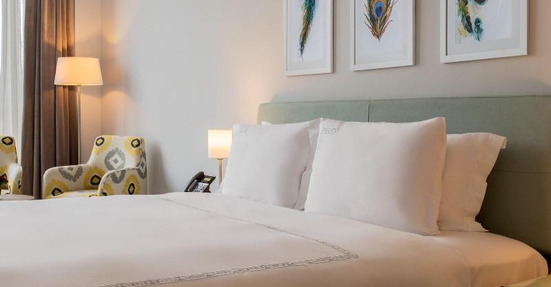 Crystal Inn Hotel - Alamein (Adults Only) El Alamein Exteriör bild A bed with two pillows